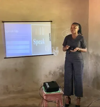 woman addressing participants