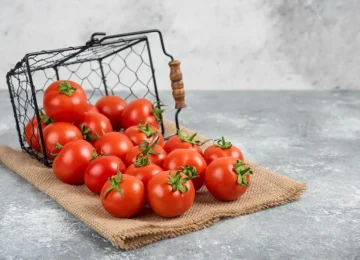 metal-basket-fresh-organic-tomatoes-marble